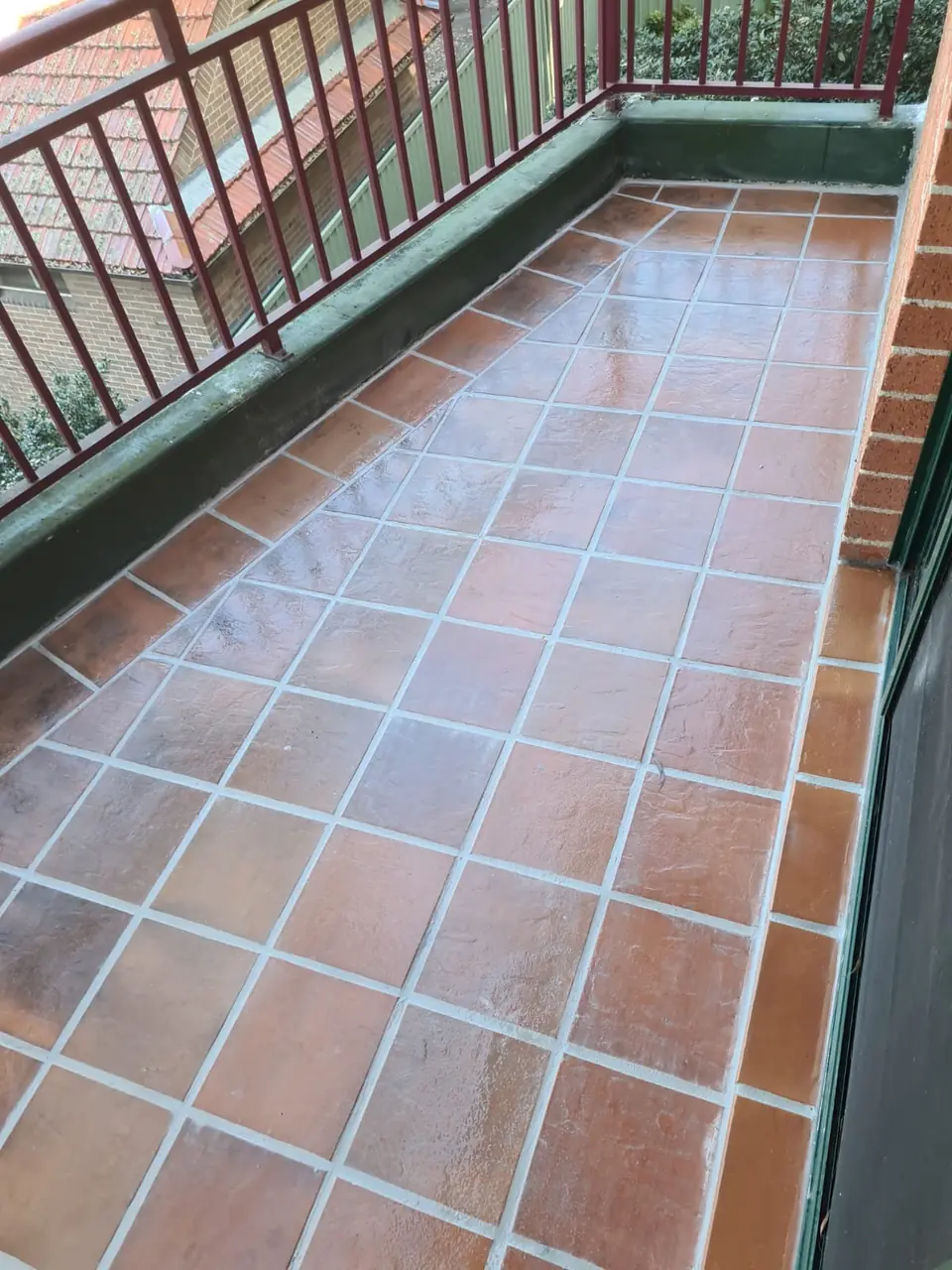 Tiled apartment balcony after regrouting and sealing by 1 Choice